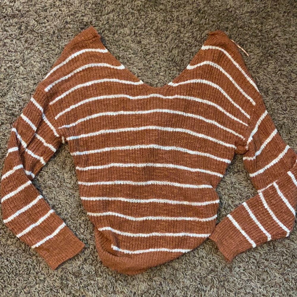 Burnt orange and white sweater, ties in back SizeM